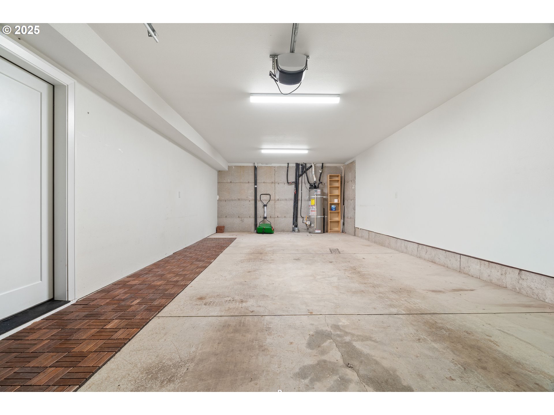 4735 Southeast Bush Street Portland, OR 97206 - Photo 43 of 47 a view of a room with wooden floor