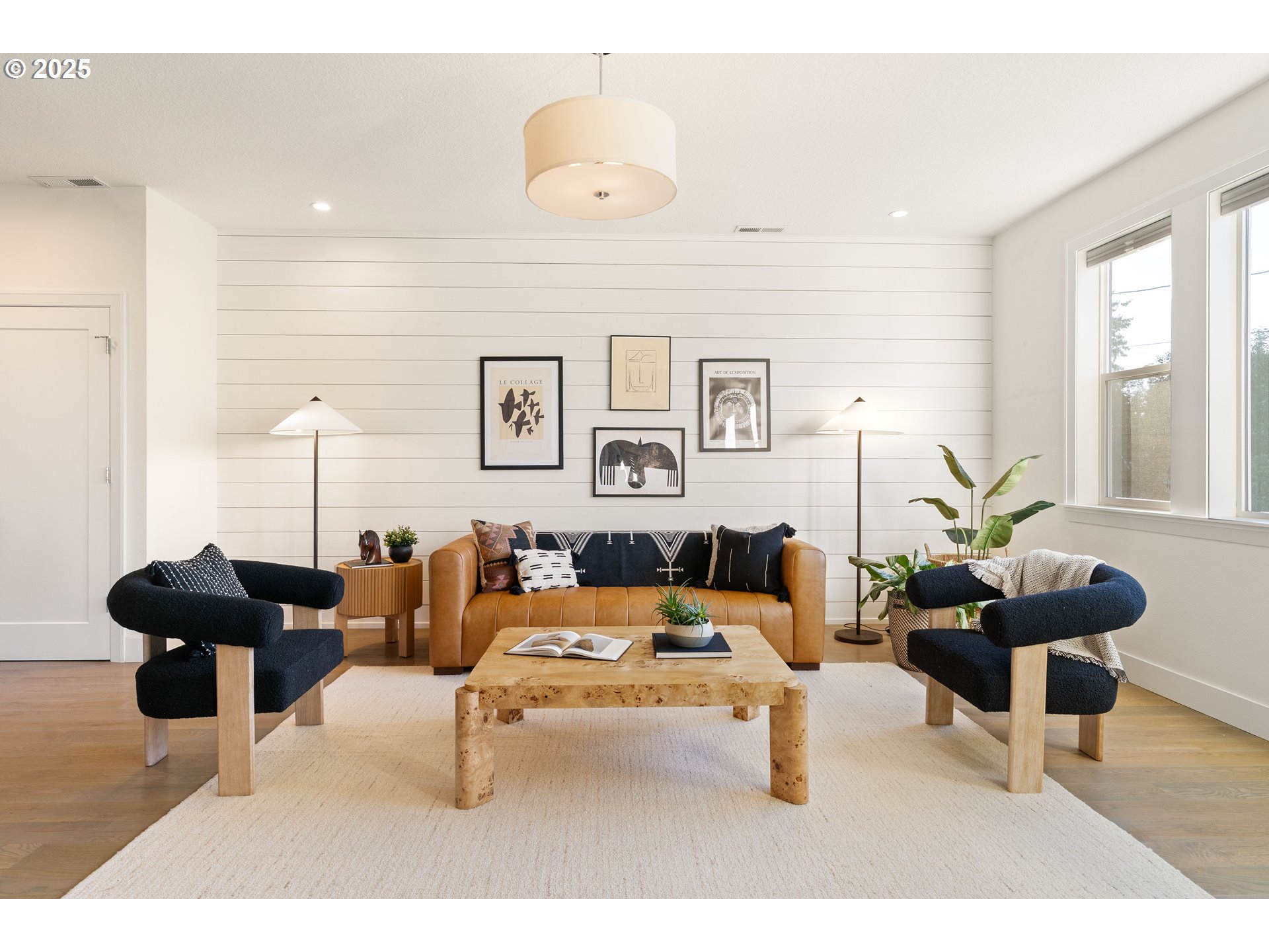 4735 Southeast Bush Street Portland, OR 97206 - Photo 6 of 47 a living room with furniture and a lamp