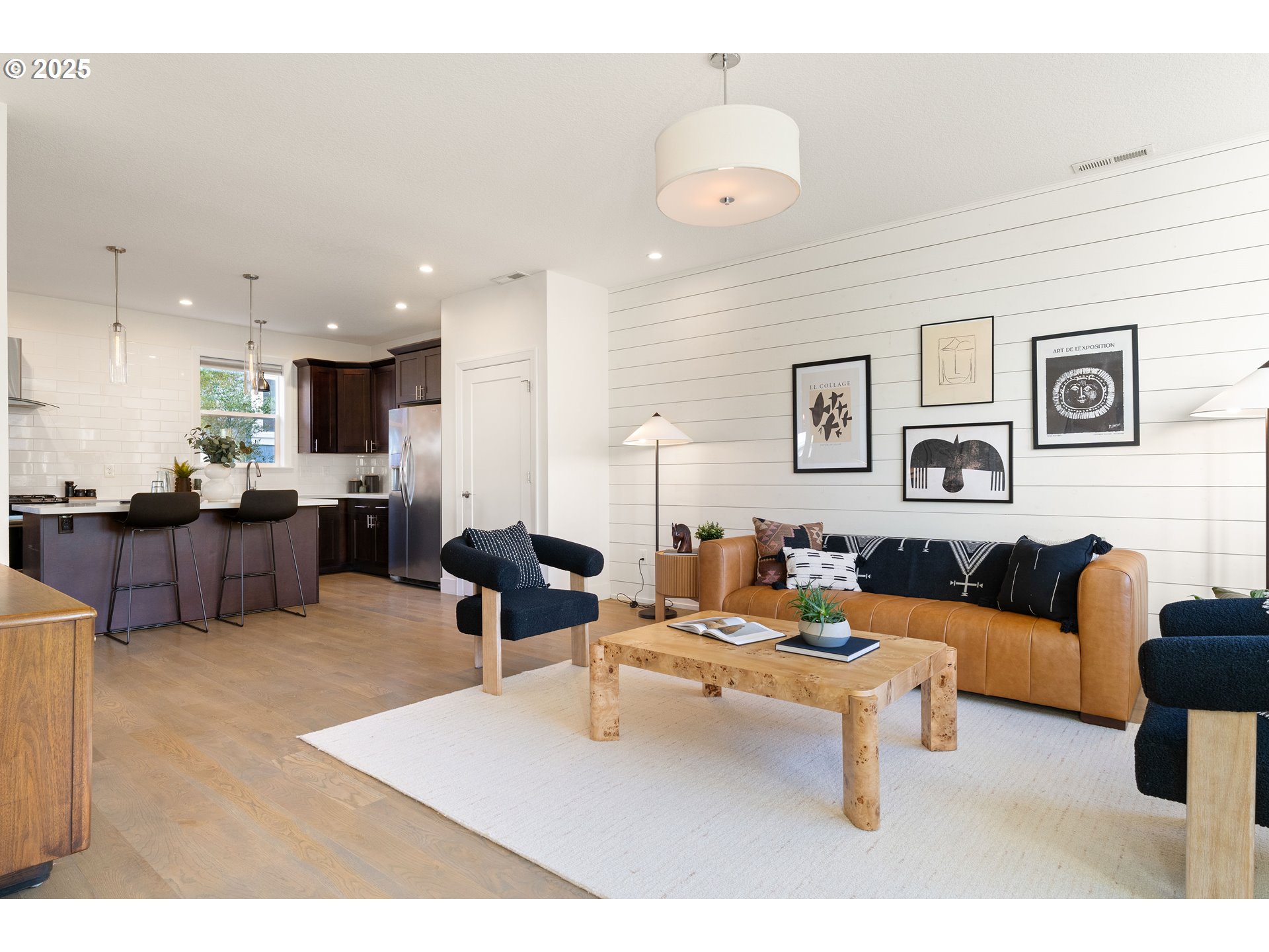 4735 Southeast Bush Street Portland, OR 97206 - Photo 7 of 47 a living room with furniture and kitchen view