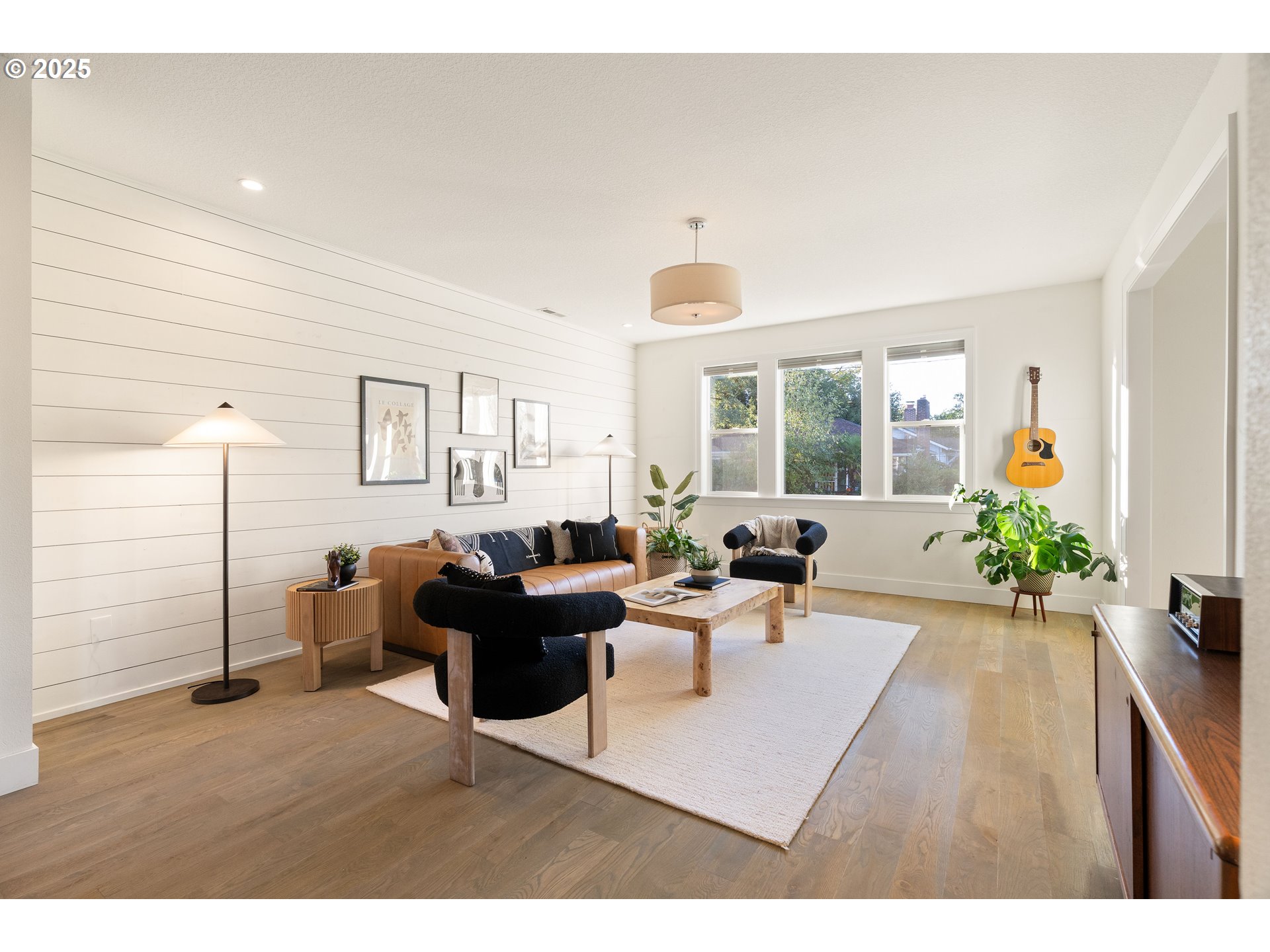 4735 Southeast Bush Street Portland, OR 97206 - Photo 8 of 47 a living room with furniture and a table