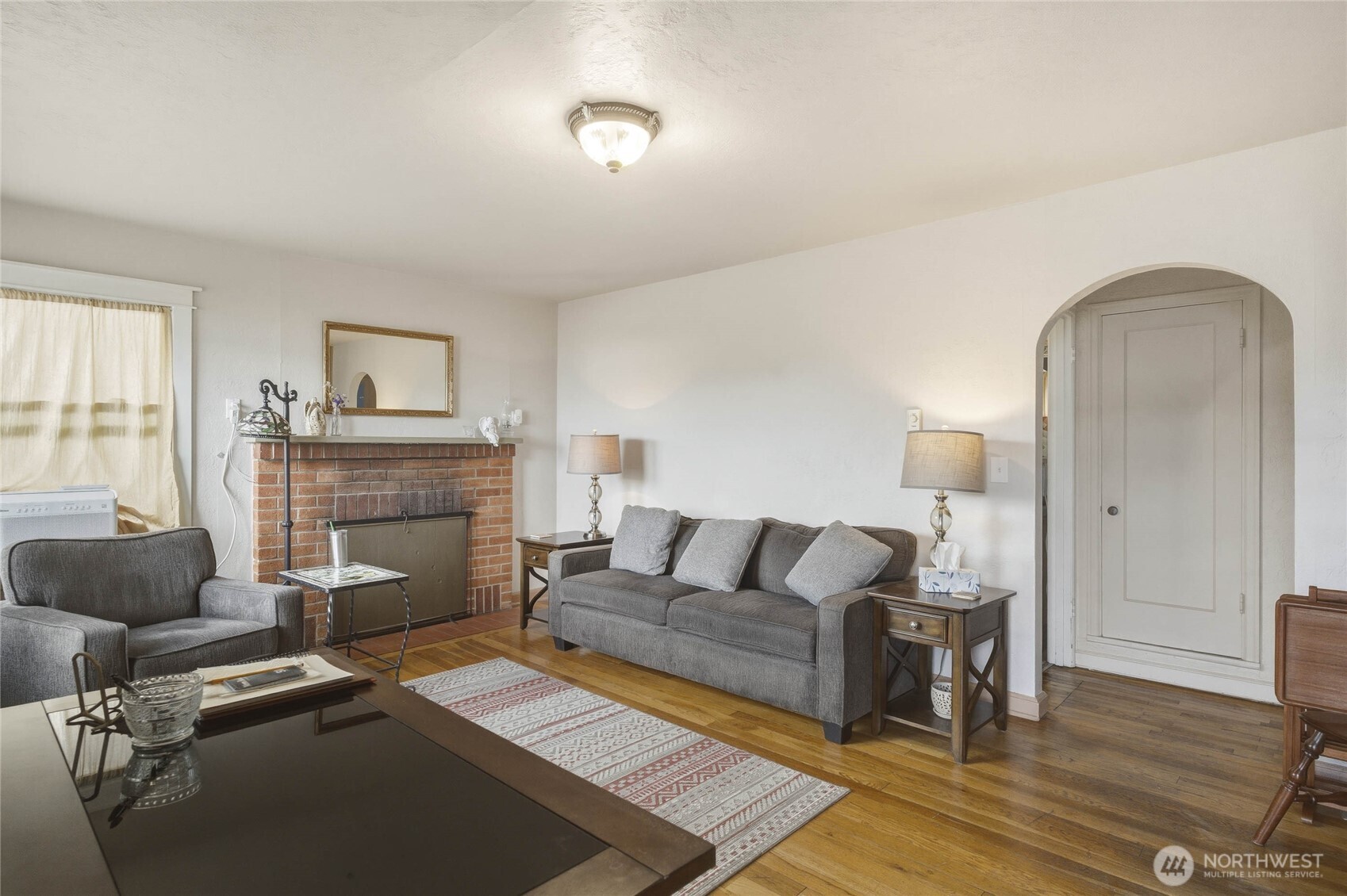 462 Beach Street Pateros, WA 98846 - Photo 6 of 30 a living room with furniture and a fireplace