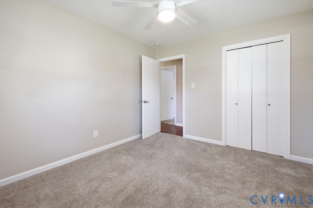 404 Bermuda Hundred Road Chester, VA 23836 - Photo 17 of 37 Neutral-toned carpeting paired with light wall pai