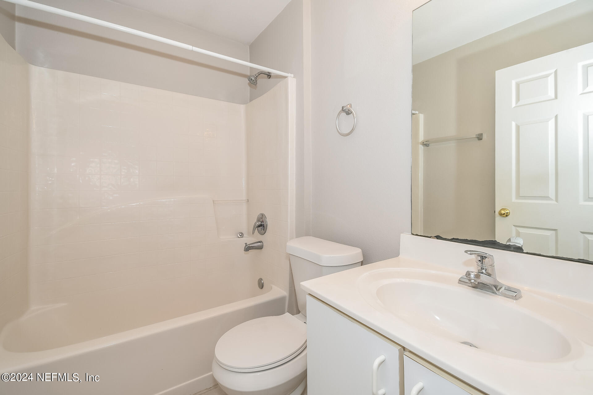 7351 Fox Grove Road Jacksonville, FL 32244 - Photo 15 of 17 a bathroom with a sink a toilet and shower