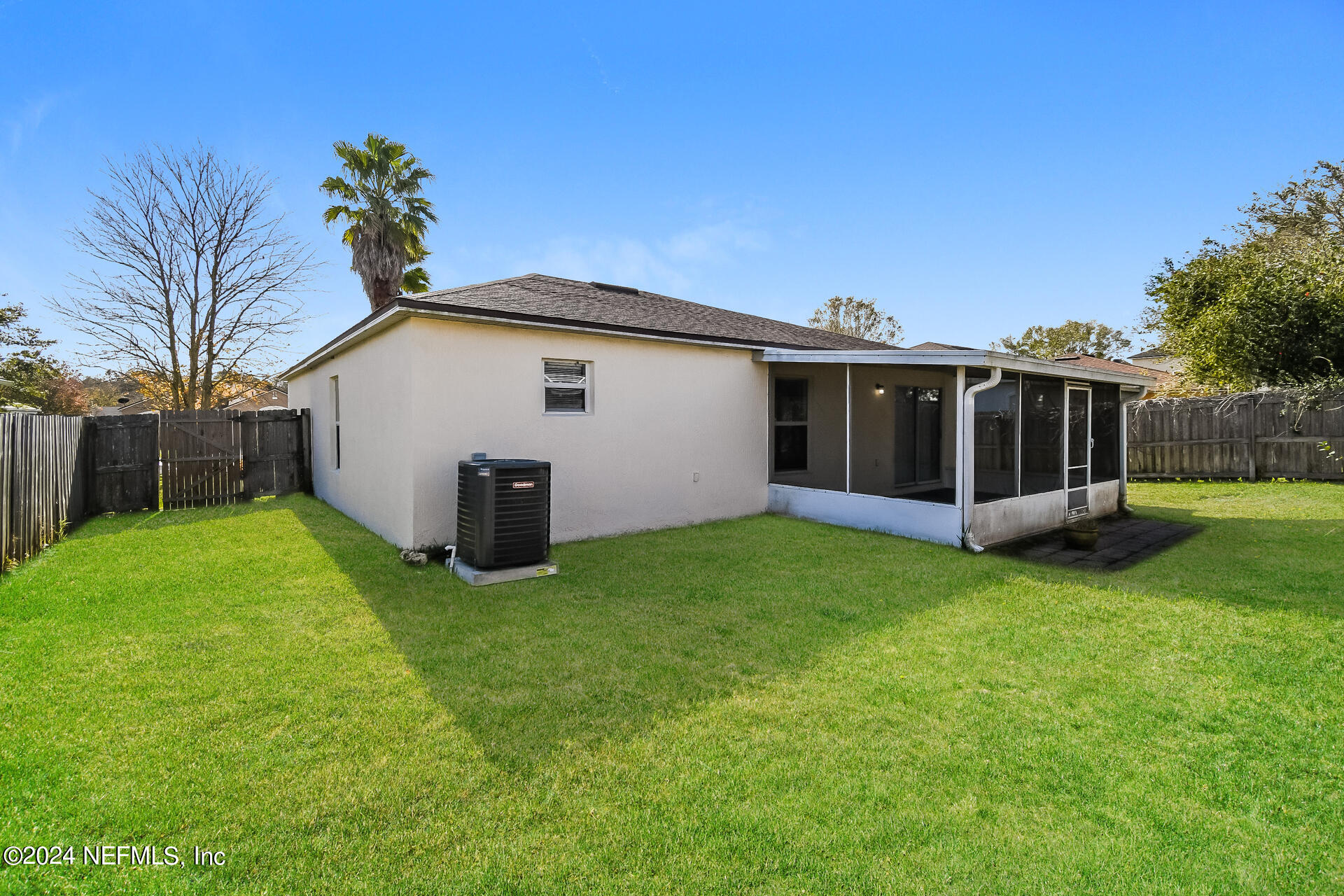 7351 Fox Grove Road Jacksonville, FL 32244 - Photo 16 of 17 a view of a house with a backyard