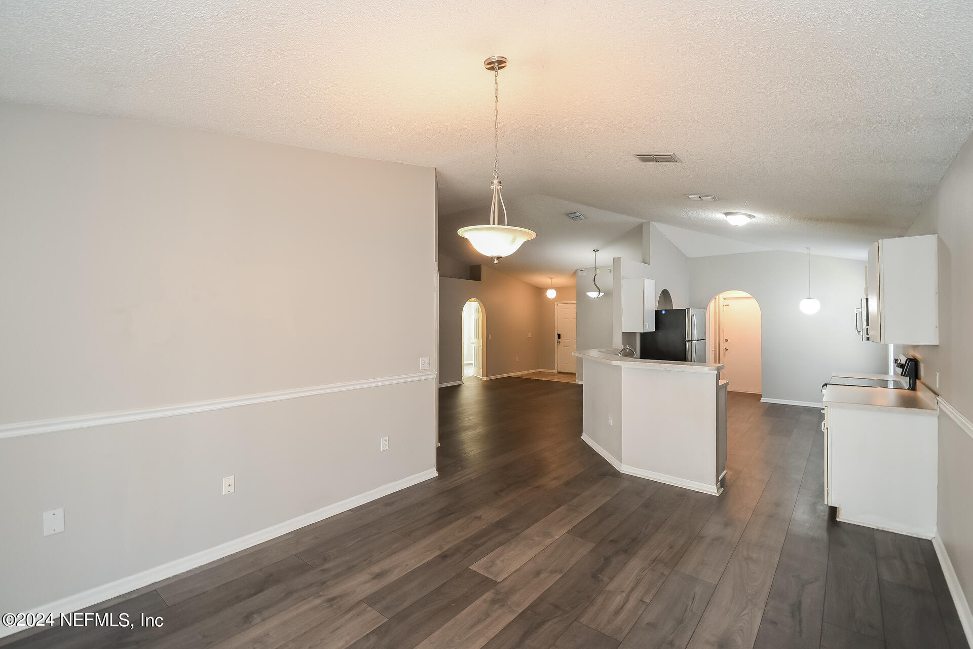 7351 Fox Grove Road Jacksonville, FL 32244 - Photo 5 of 17 a view of a room with wooden floor