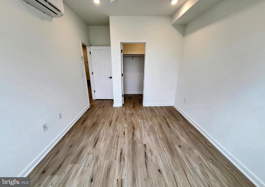 22 East Rittenhouse Street, Unit 3 Philadelphia, PA 19144 - Photo 9 of 13 a view of a room with wooden floor and a window