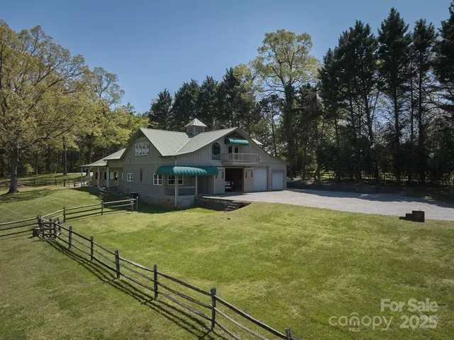 a view of house with yard