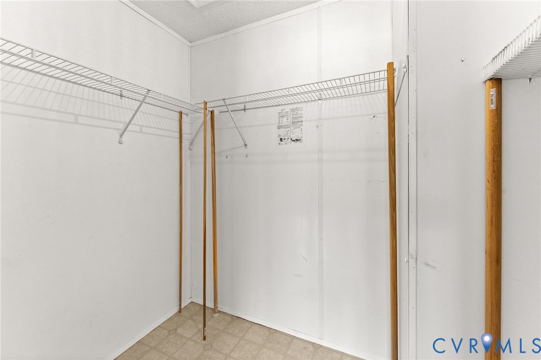 1450 Mt Prospect Road Laneview, VA 22504 - Photo 14 of 25 Primary Bedroom walk-in closet.