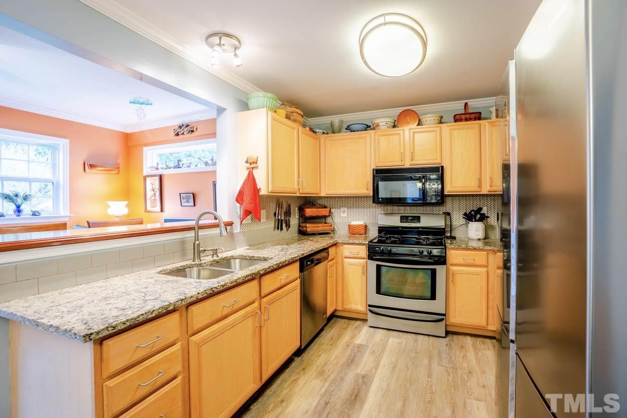 2914 Sparger Road Durham, NC 27705 - Photo 8 of 30 Granite Counters, Tile Backsplash, Gas Range, All appliances remain!