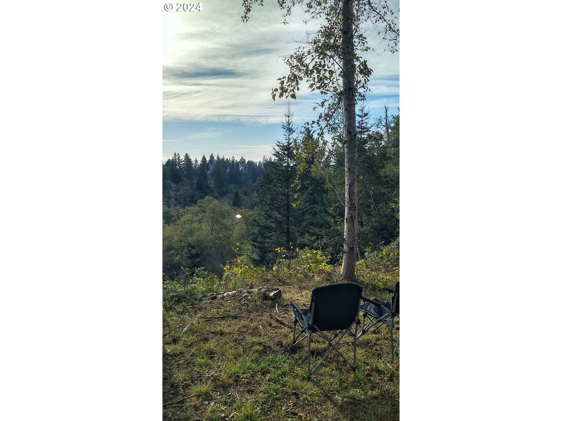 Rhody Drive, Unit 600 Brookings, OR 97415 - Photo 2 of 12 a bathroom with a sink and a vanity