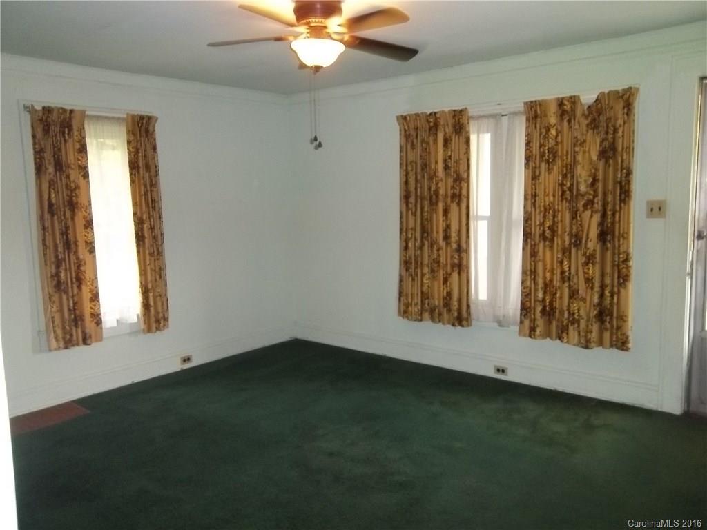 635 Allen Farm Road Canton, NC 28716 - Photo 4 of 11 an empty room with windows and closet