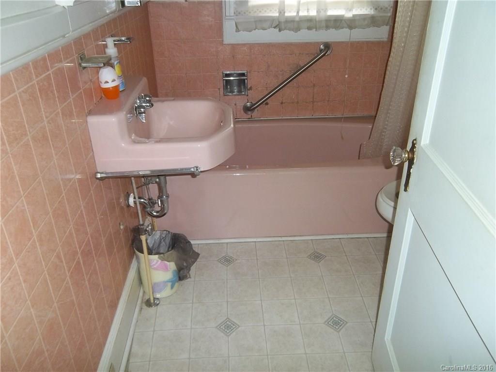 635 Allen Farm Road Canton, NC 28716 - Photo 5 of 11 a bathroom with a sink and mirror