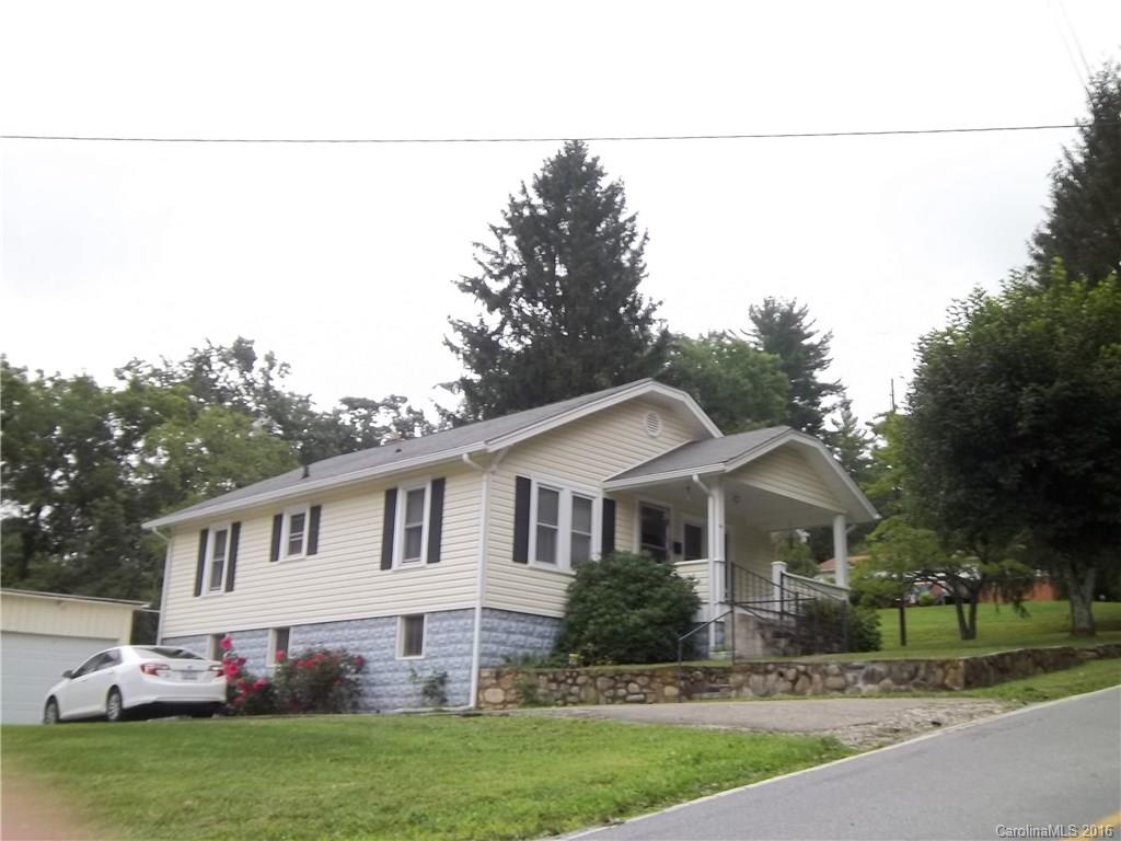 635 Allen Farm Road Canton, NC 28716 - Photo 10 of 11 a front view of a house with a garden