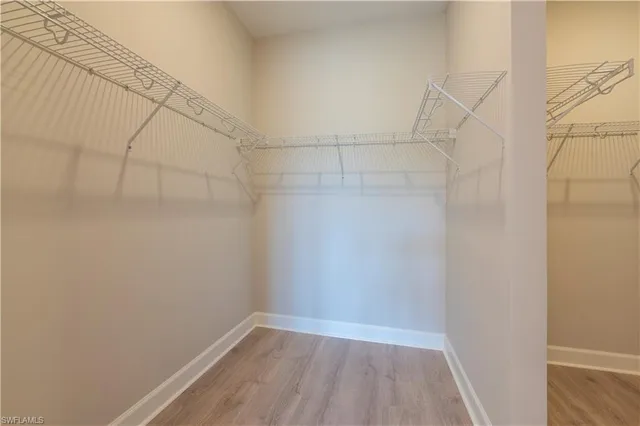 a view of a room with racks on the wall