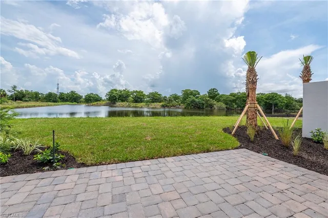 a view of a garden with a lake