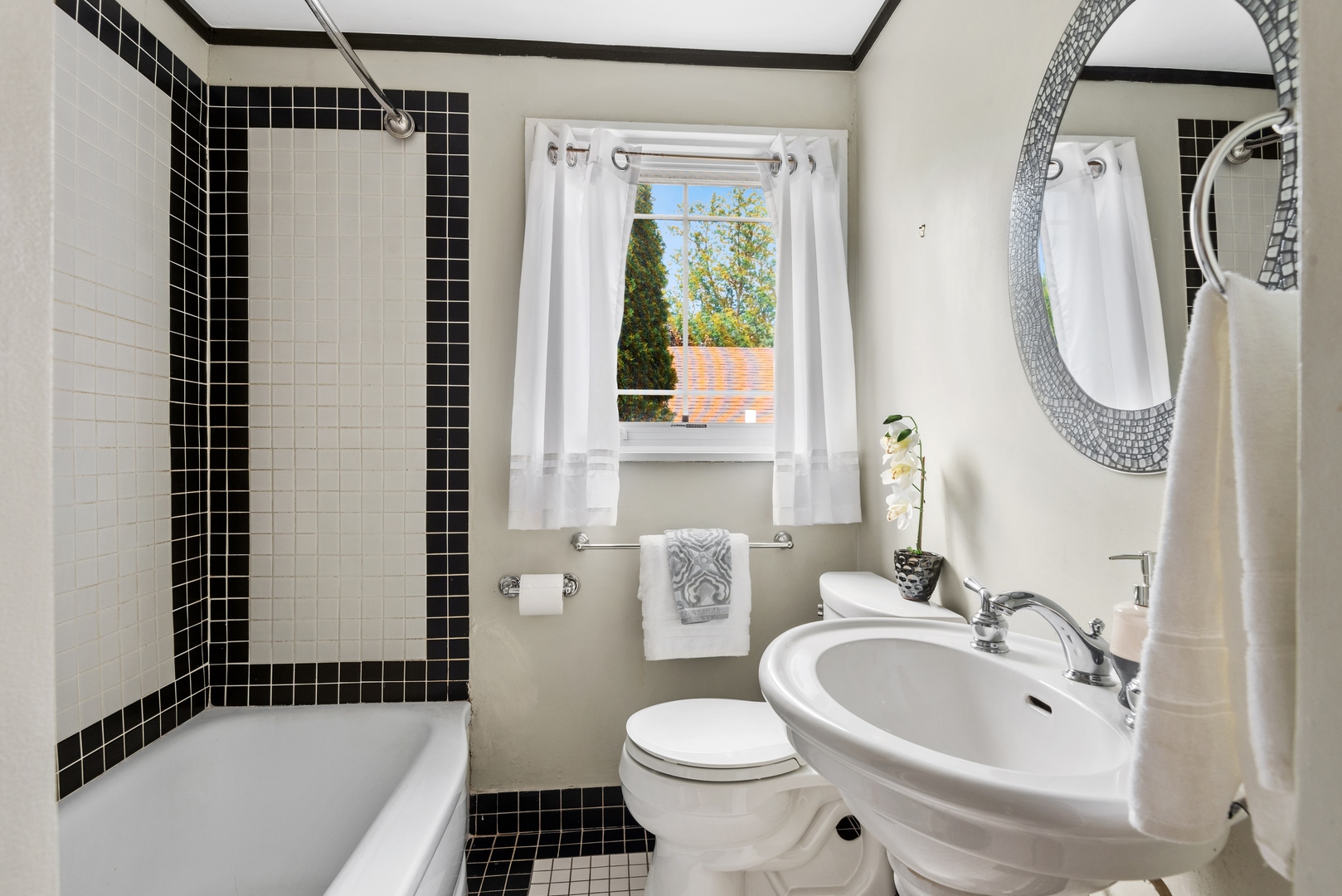 2040 Central Avenue Wilmette, IL 60091 - Photo 13 of 22 a bathroom with a sink toilet and shower
