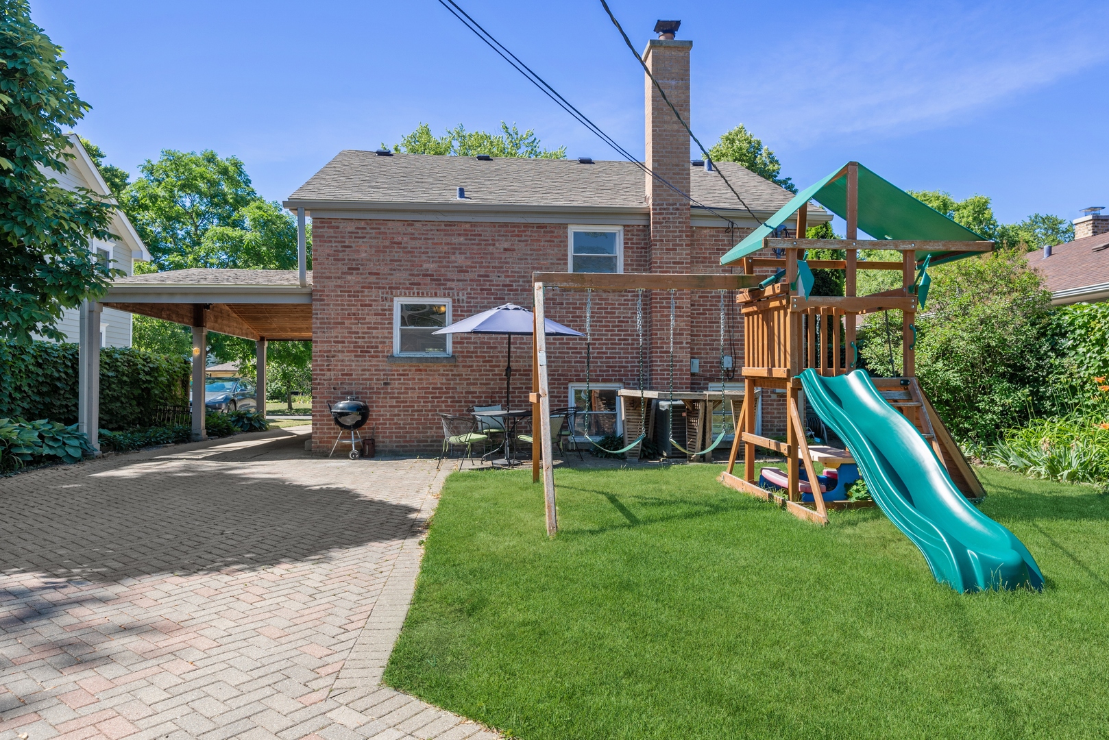 2040 Central Avenue Wilmette, IL 60091 - Photo 18 of 22 a view of a house with a yard