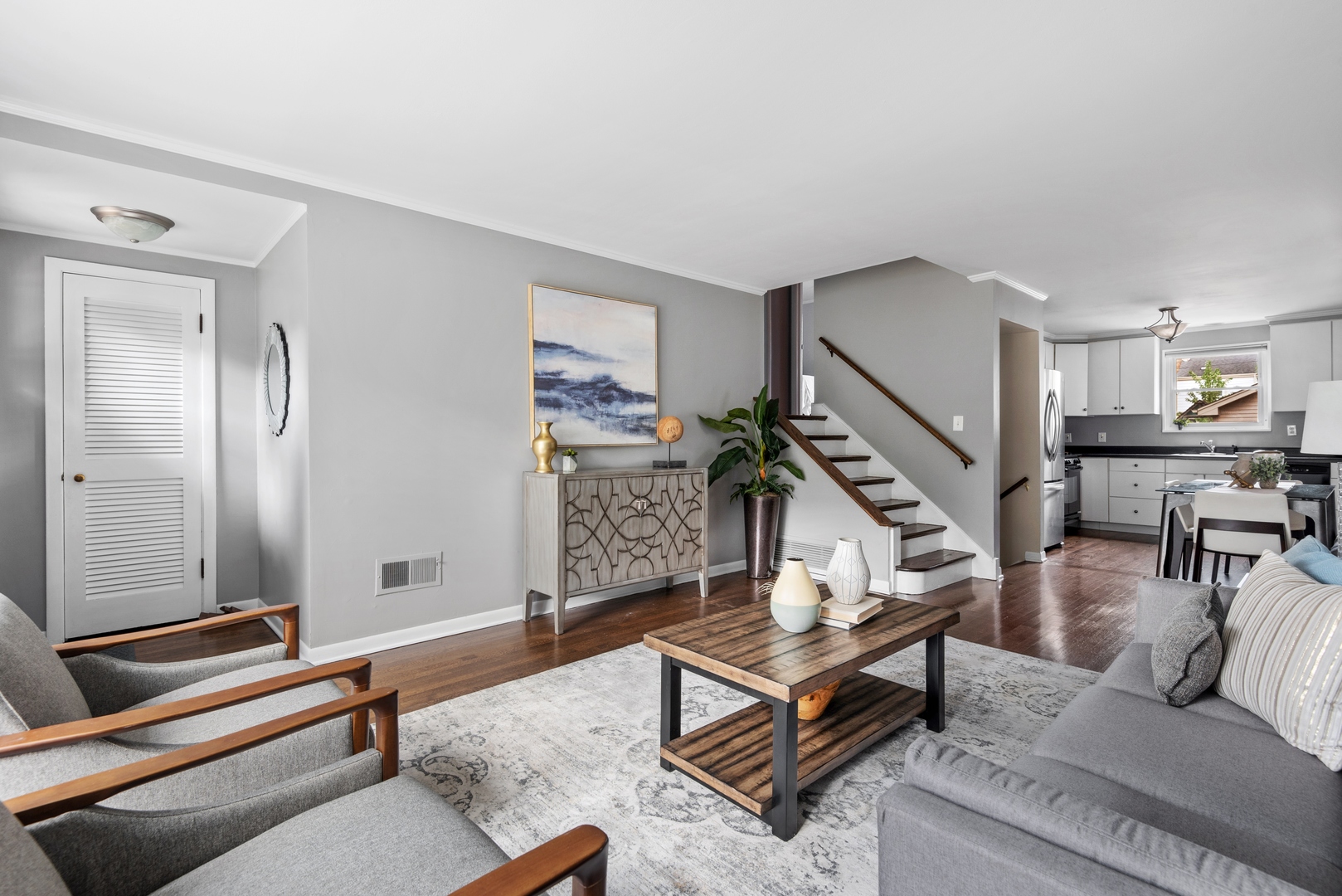 2040 Central Avenue Wilmette, IL 60091 - Photo 3 of 22 a living room with furniture and a wooden floor