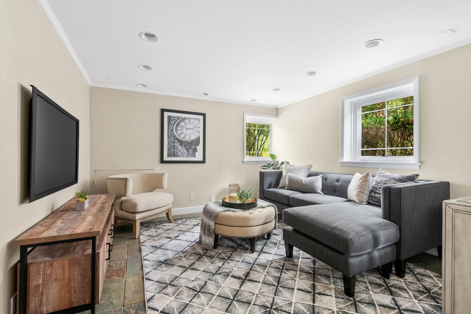 2040 Central Avenue Wilmette, IL 60091 - Photo 7 of 22 a living room with furniture and a flat screen tv