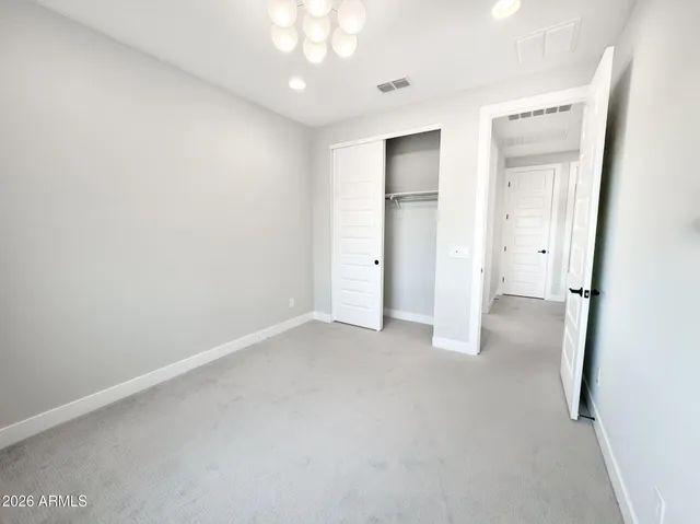 a bathroom with a shower sink and mirror