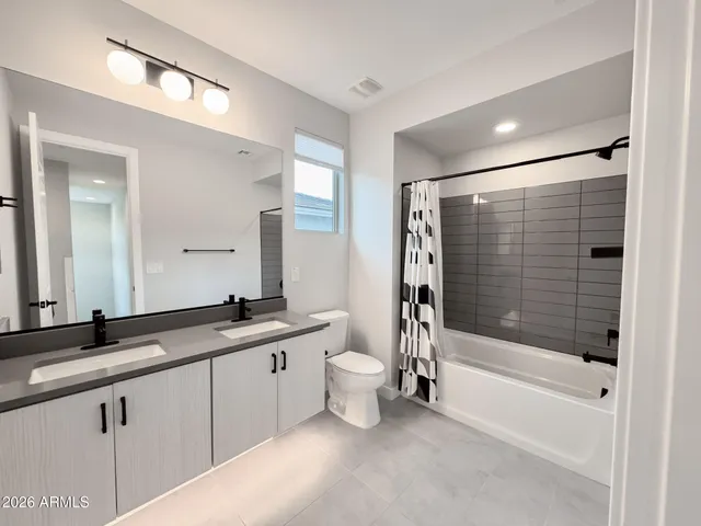 an empty room with a chandelier