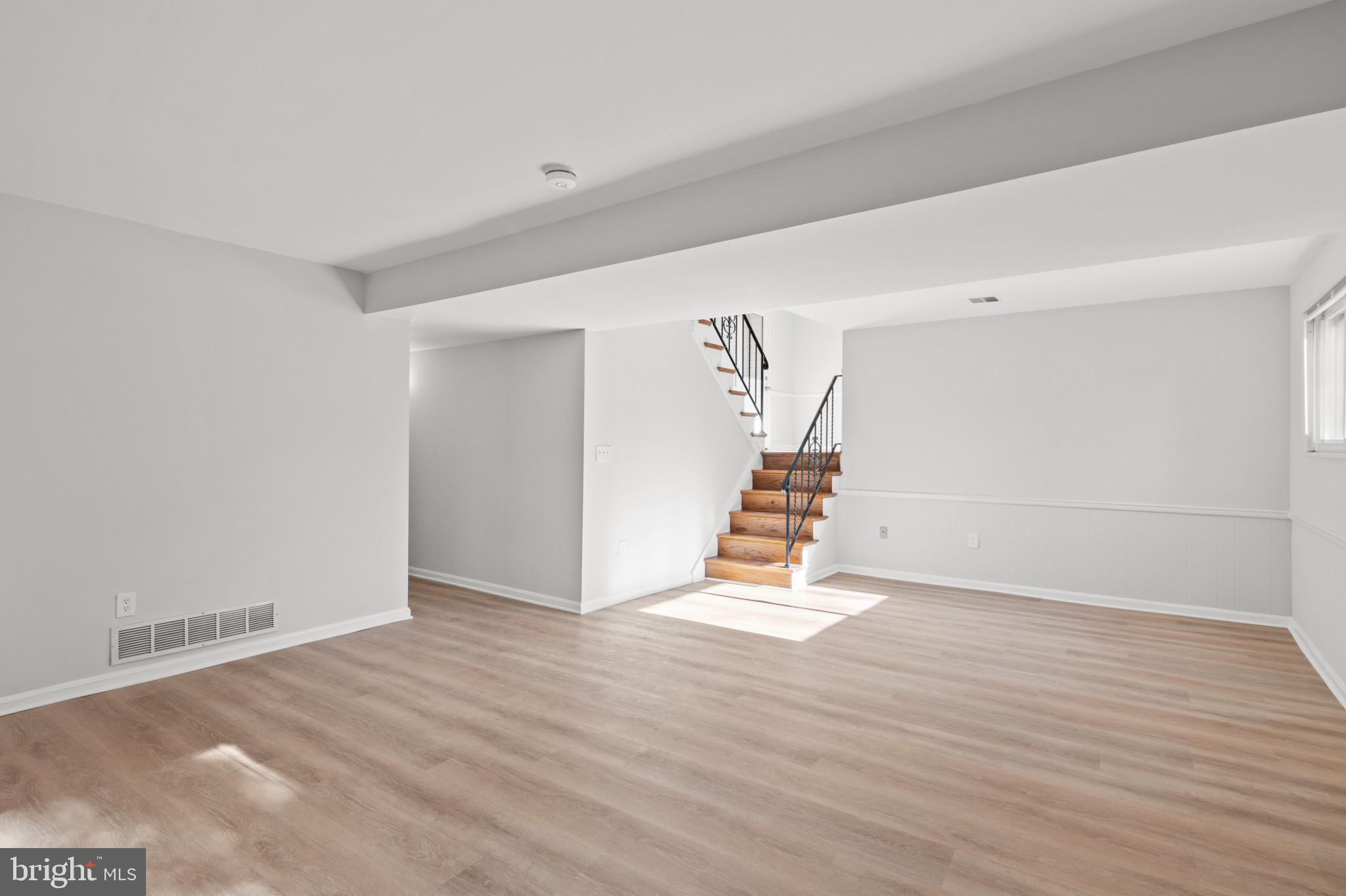 100 Oak Drive Annapolis, MD 21403 - Photo 12 of 32 a view of an empty room with stairs and ventilation