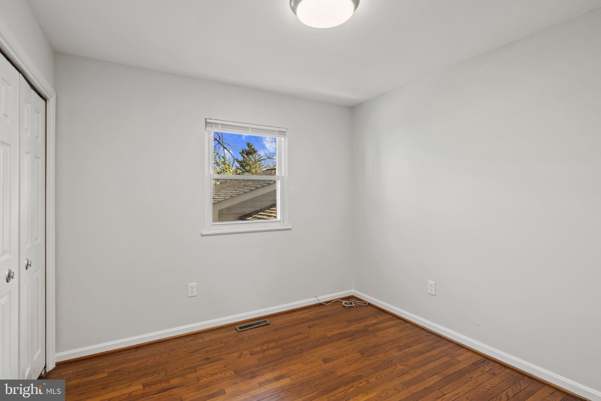 100 Oak Drive Annapolis, MD 21403 - Photo 20 of 32 a view of empty room with wooden floor