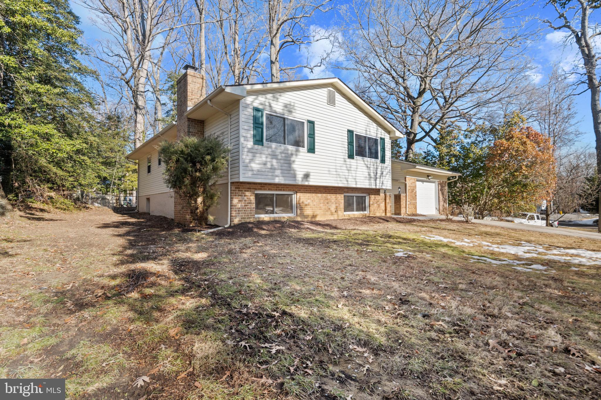 100 Oak Drive Annapolis, MD 21403 - Photo 2 of 32 a front view of a house with a yard