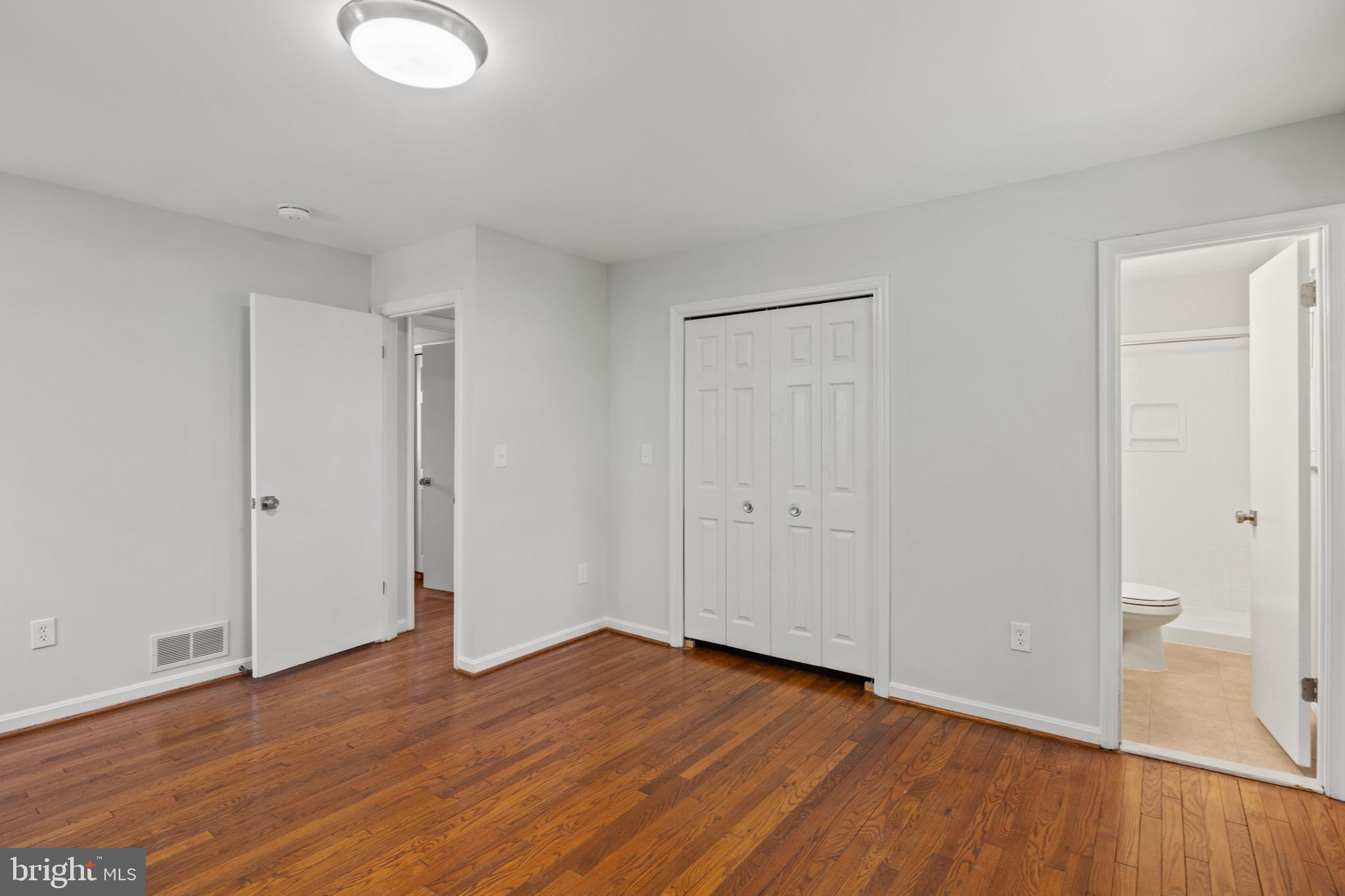 100 Oak Drive Annapolis, MD 21403 - Photo 25 of 32 a view of an empty room and wooden floor