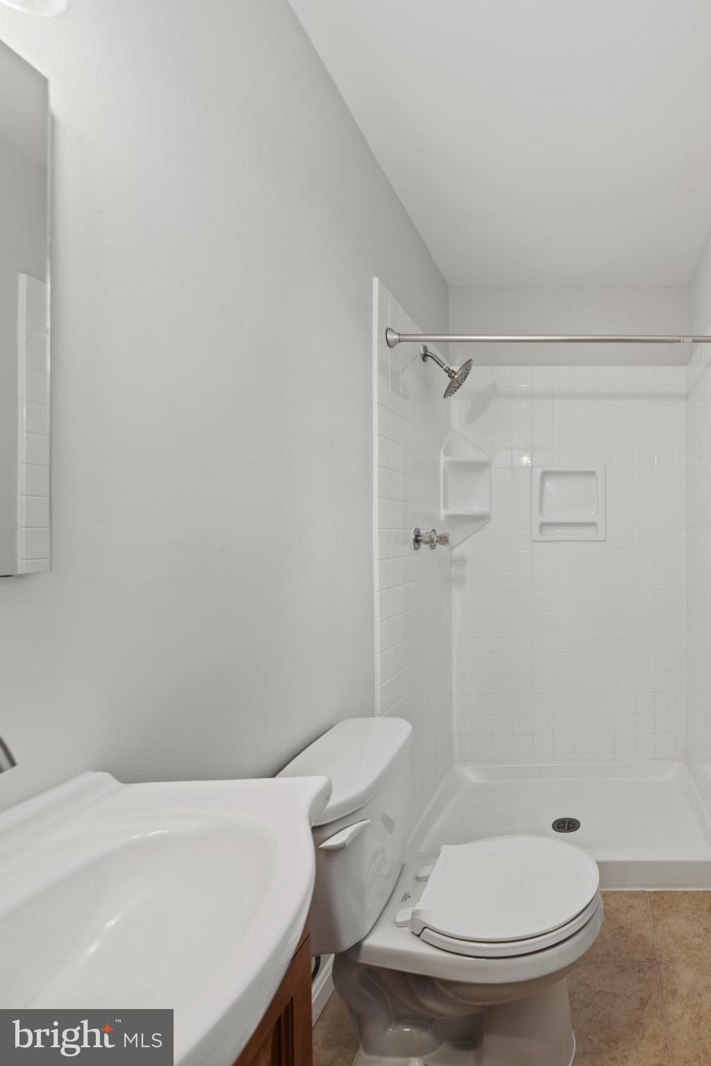 100 Oak Drive Annapolis, MD 21403 - Photo 27 of 32 a white toilet sitting next to a bath tub