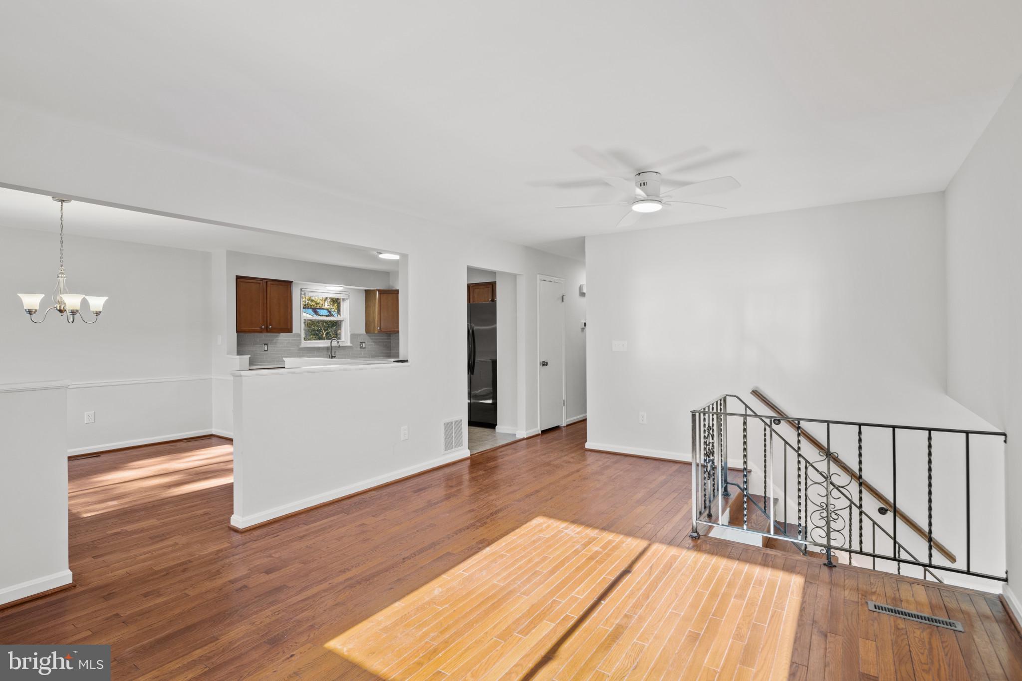 100 Oak Drive Annapolis, MD 21403 - Photo 4 of 32 a view of a livingroom with wooden floor