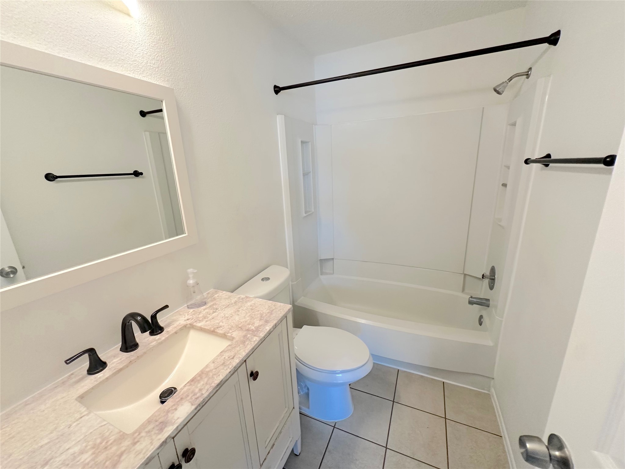 3103 Cliff Swallow Court Spring, TX 77373 - Photo 19 of 33 Another view of primary bath with tile flooring.
