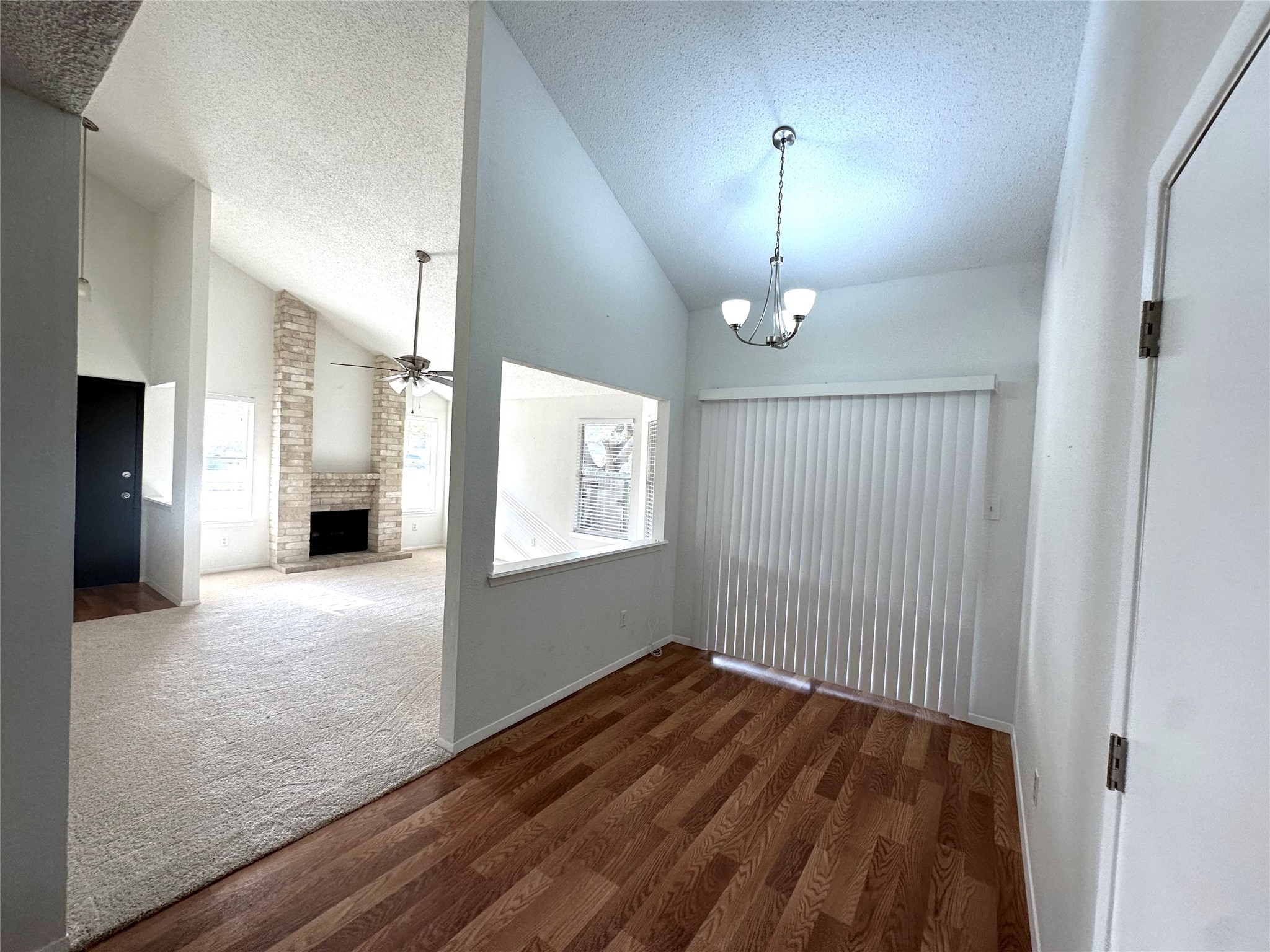3103 Cliff Swallow Court Spring, TX 77373 - Photo 5 of 33 Off den is a great dining area with access to backyard. Beautiful laminate flooring and nice light fixture.