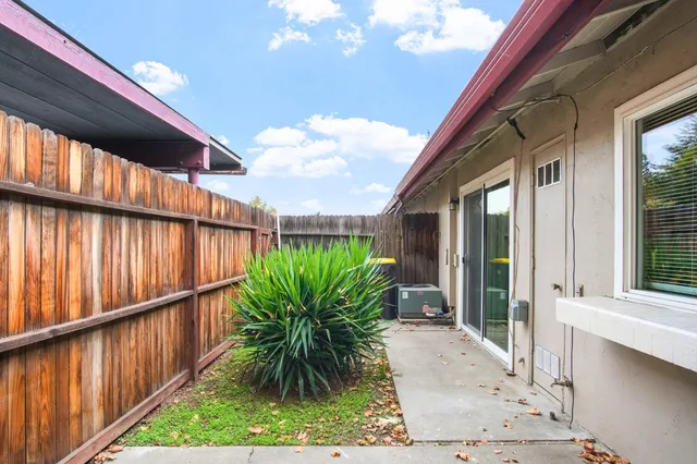 a view of balcony with furniture