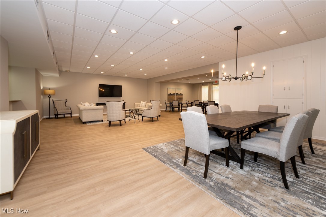 2365 Covington Road, Unit 221 Akron, OH 44313 - Photo 34 of 50 View of the community roomshowing seating area and wall mounted TV, recently totally renovated by Chez Del,