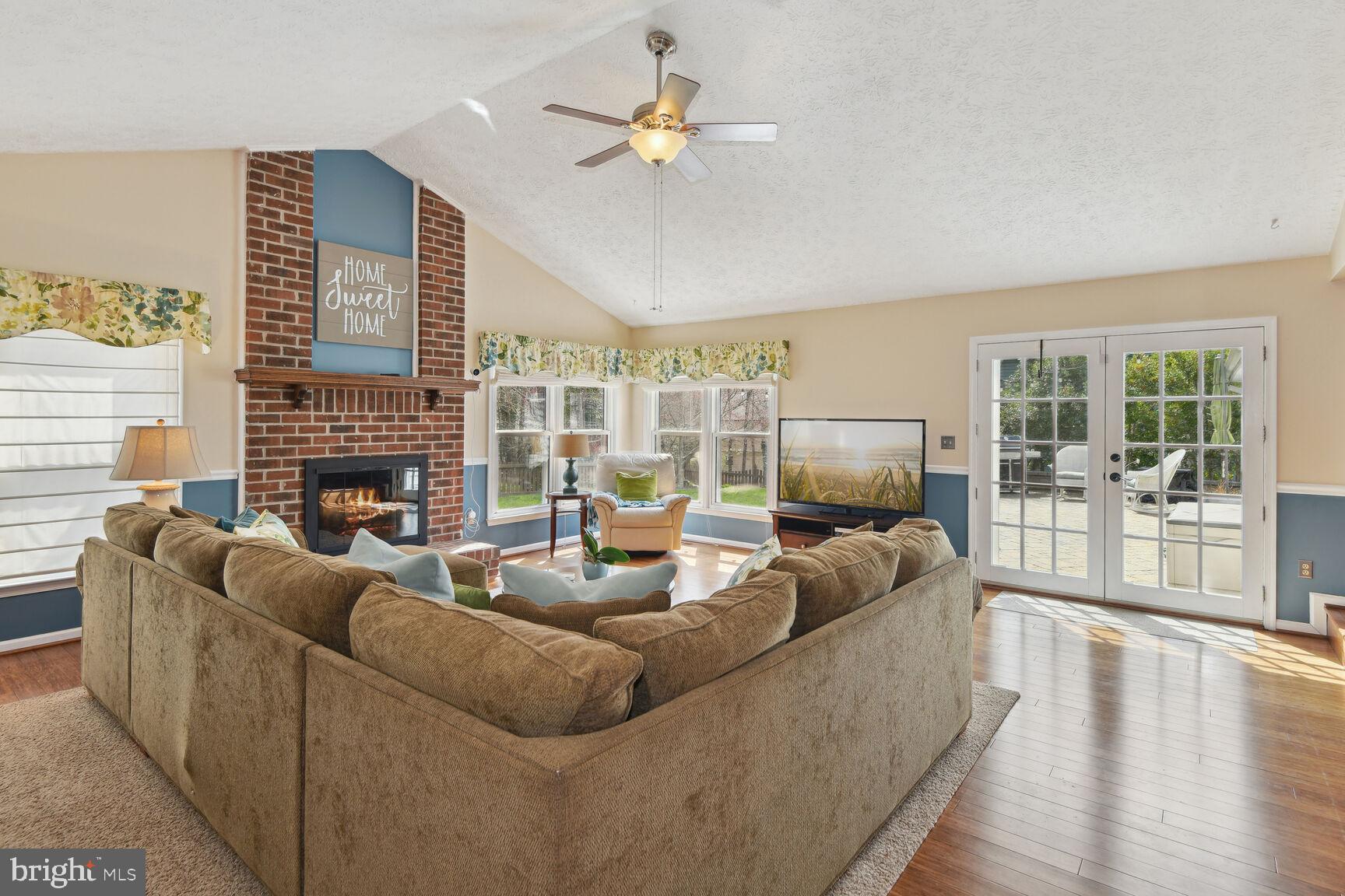 251 Brookline Court Riva, MD 21140 - Photo 8 of 34 Family room, vaulted ceiling, doors to stone patio