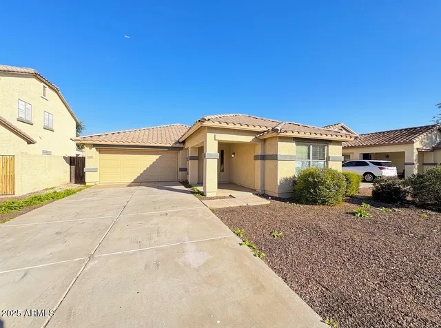a very nice looking house with a large window