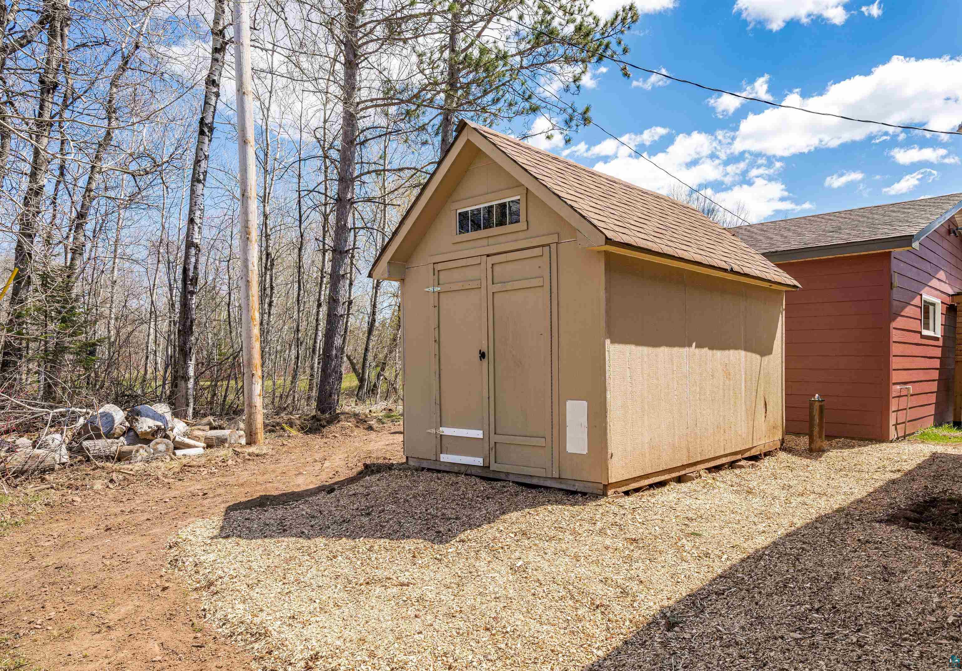 3325 Strand Road Duluth, MN 55803 - Photo 10 of 25 Freestanding storage shed with a gabled roof.