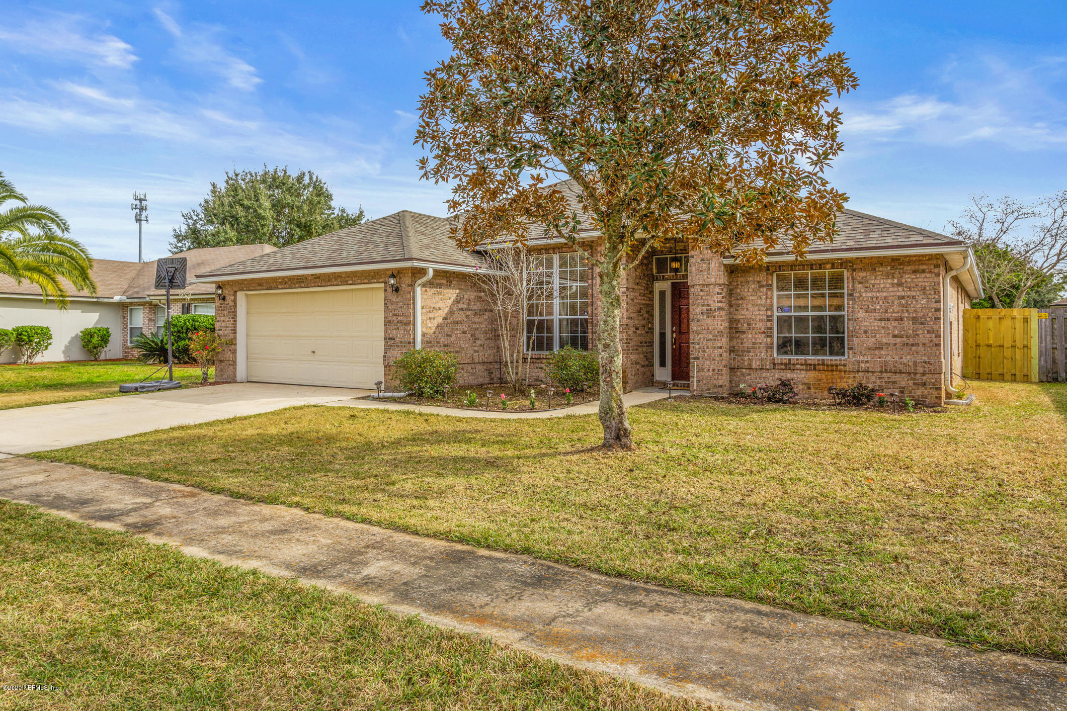 8145 Leafcrest Drive Jacksonville, FL 32244 - Photo 2 of 25 a view of a house with a yard