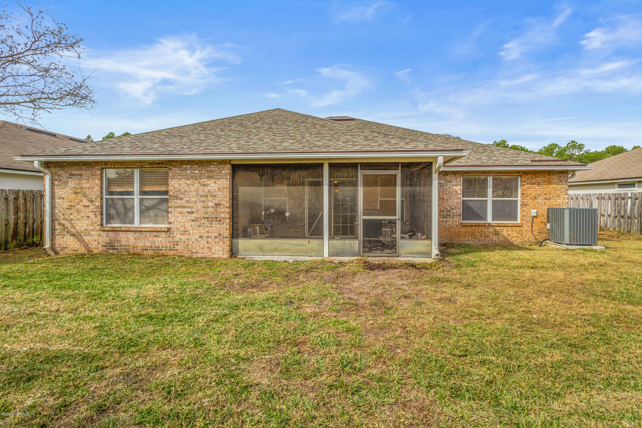 8145 Leafcrest Drive Jacksonville, FL 32244 - Photo 22 of 25 front view of a house with a yard