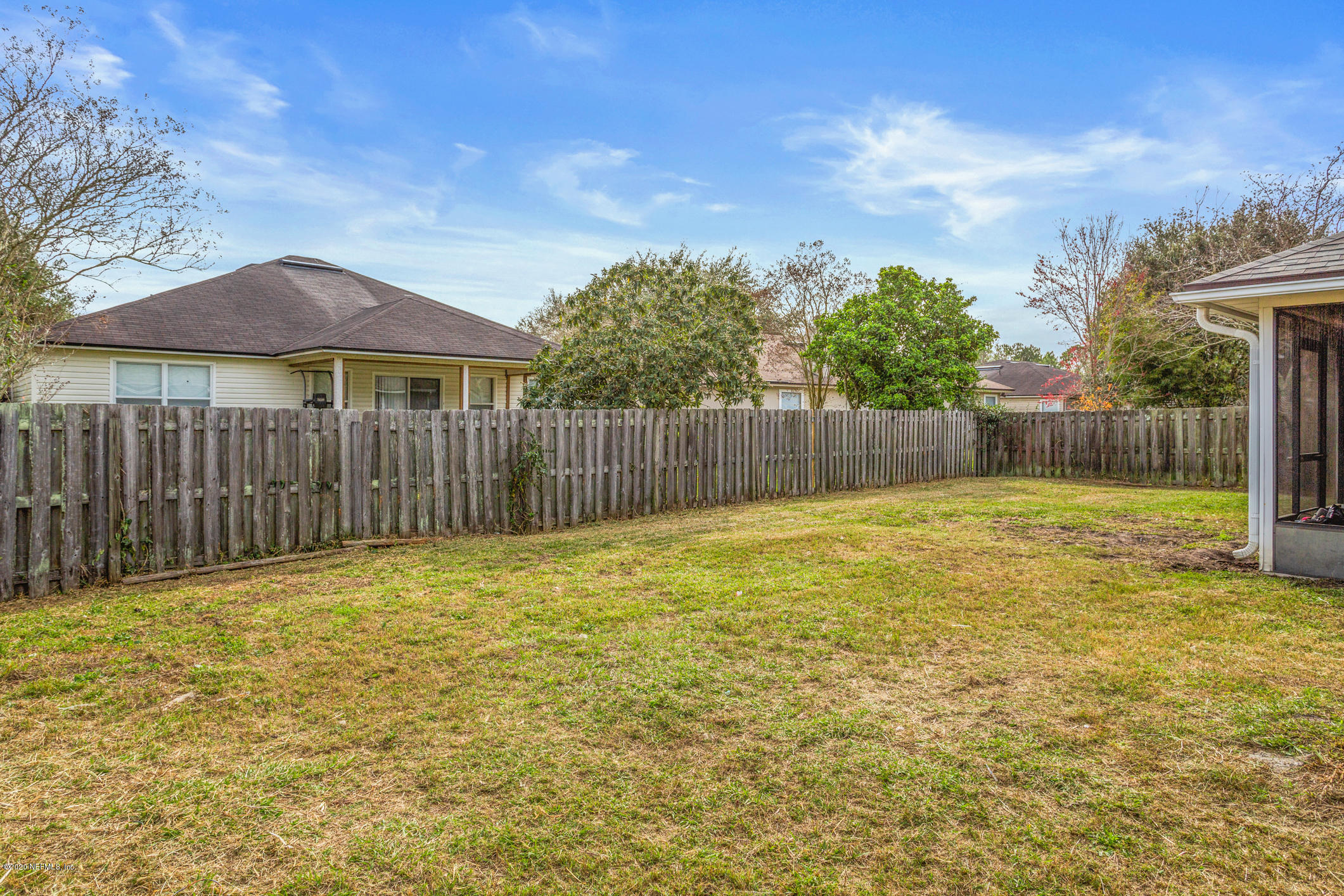 8145 Leafcrest Drive Jacksonville, FL 32244 - Photo 25 of 25 a swimming pool with wooden fence