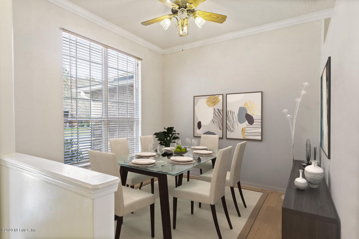 8145 Leafcrest Drive Jacksonville, FL 32244 - Photo 5 of 25 a view of a dining room with furniture and window