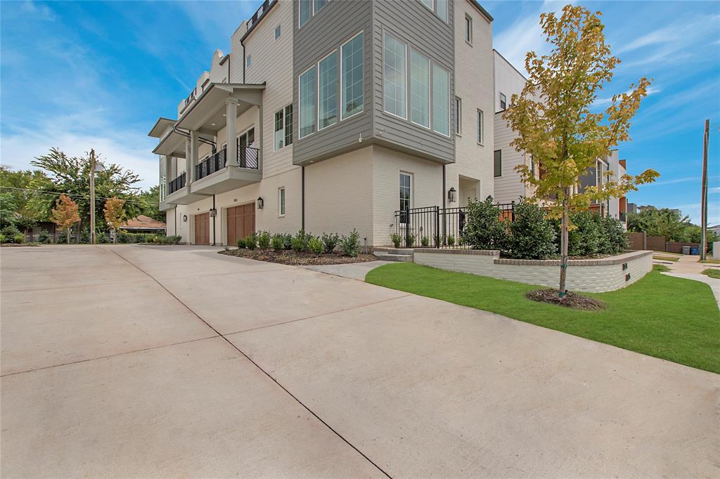 1031 Mobile Street Dallas, TX 75208 - Photo 2 of 28 a view of a white house with a yard