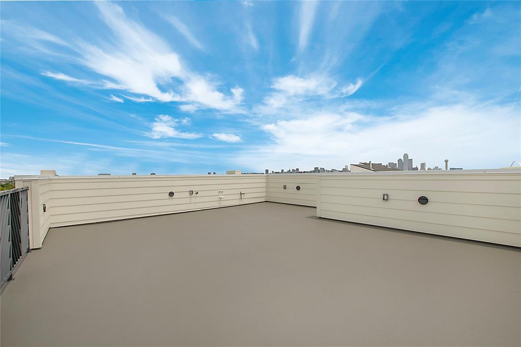 1031 Mobile Street Dallas, TX 75208 - Photo 24 of 28 a view of beach and ocean