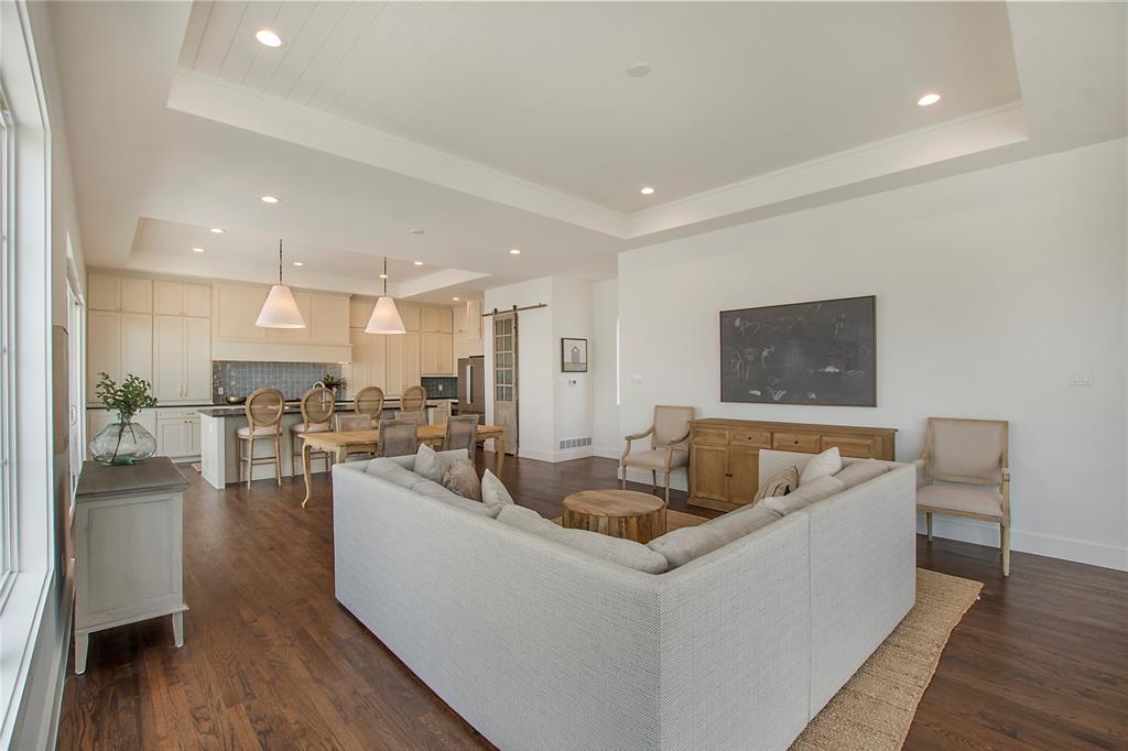 1031 Mobile Street Dallas, TX 75208 - Photo 9 of 28 a living room with furniture and a wooden floor