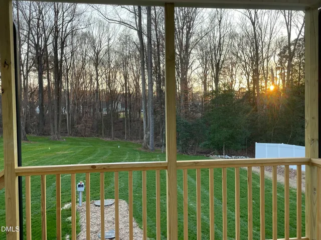 a view of a yard with a trees