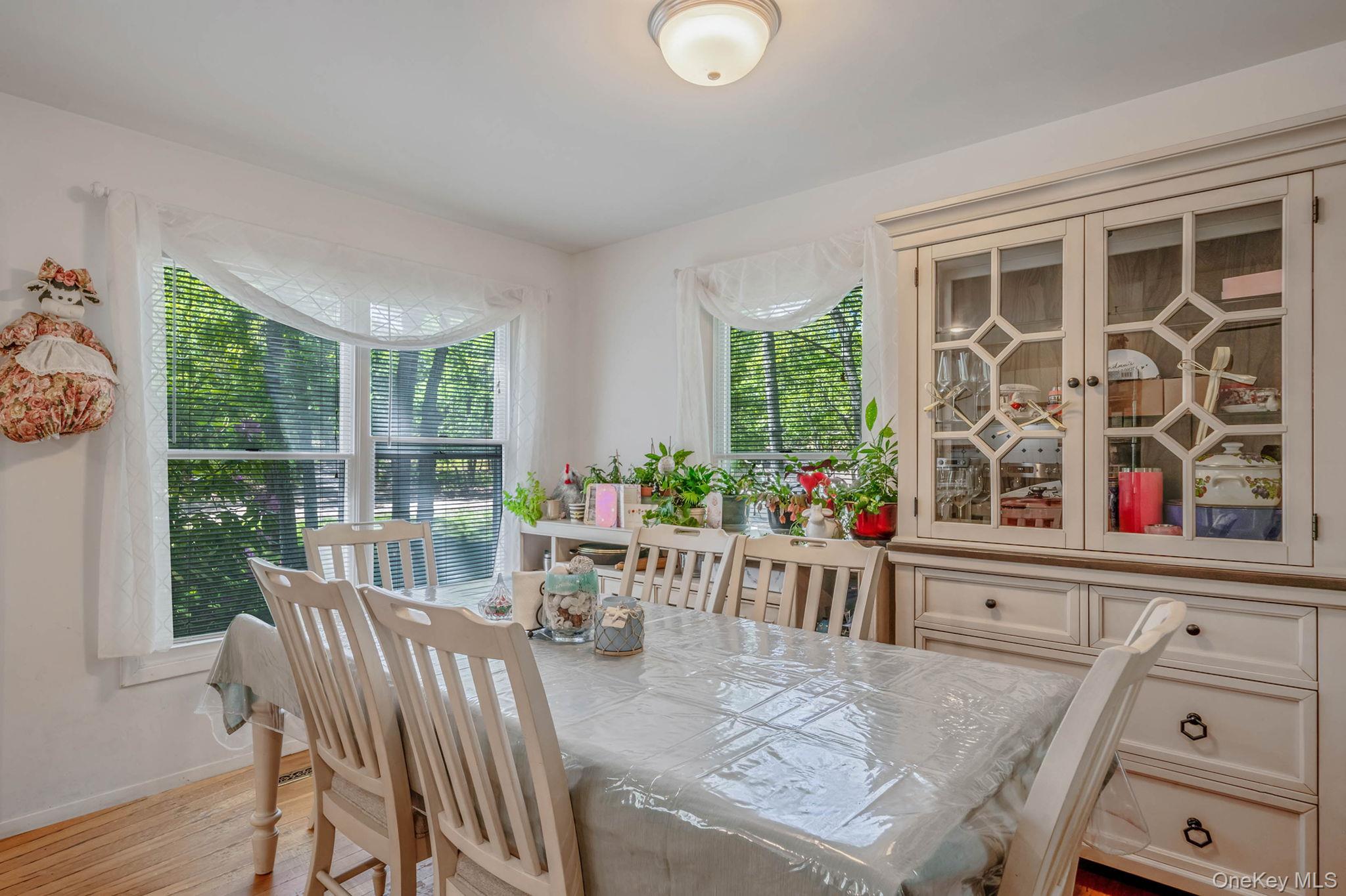 28 Huntting Road East Hampton, NY 11937 - Photo 4 of 14 Dining room featuring light wood finished floors and baseboards