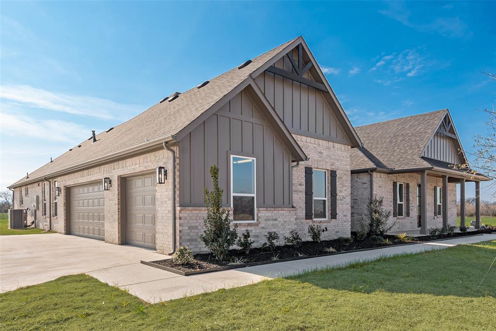 5291 Sunset Road Caddo Mills, TX 75135 - Photo 2 of 39 a front view of a house with a yard