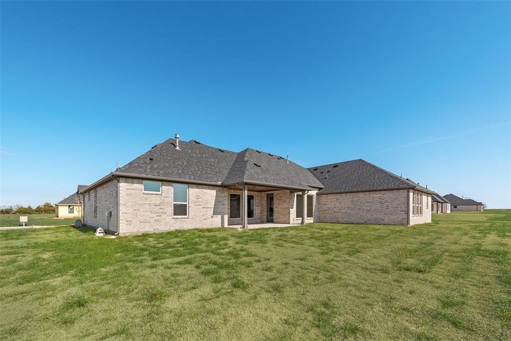 5291 Sunset Road Caddo Mills, TX 75135 - Photo 38 of 39 a house view with a garden space