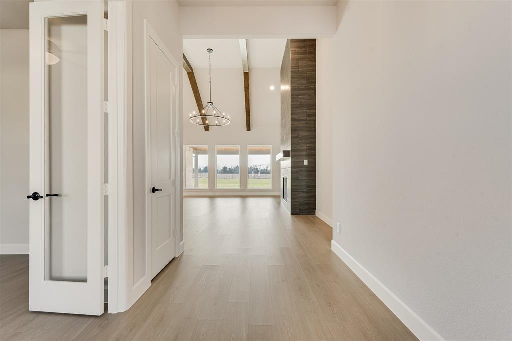 5291 Sunset Road Caddo Mills, TX 75135 - Photo 6 of 39 a view of a hallway with wooden floor